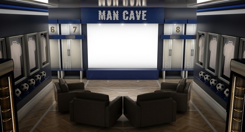 interior dramáticamente iluminado de una cueva de hombre con temática de fútbol_Inked Pixels_shutterstock
